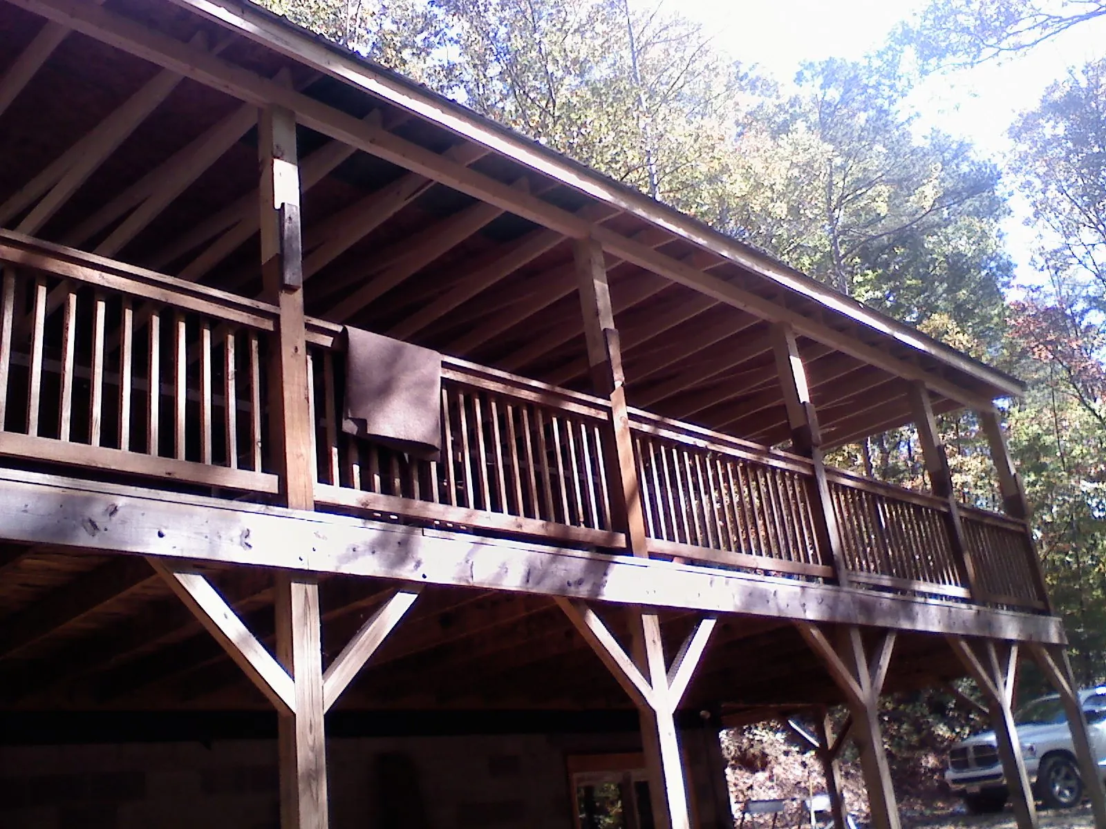 Timber framing under a new elevated porch and deck — Roof Leak Repair in Saint Bonifacius by Roofing Brothers